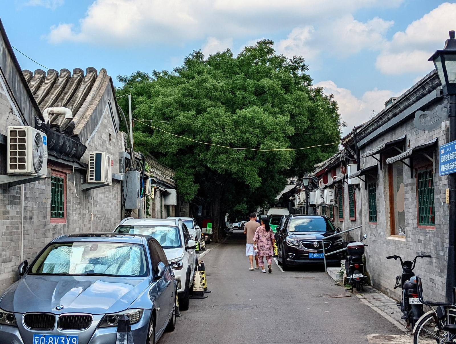A grey-brick hutong lane in the Dongsi quarter, near Shijia Hutong