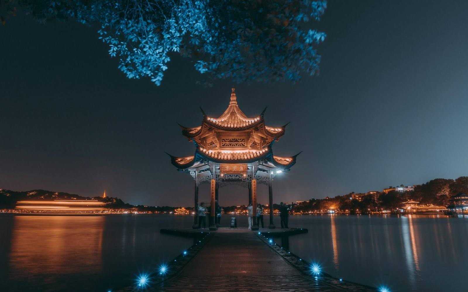 Sunset over West Lake with the Leifeng Pagoda in silhouette